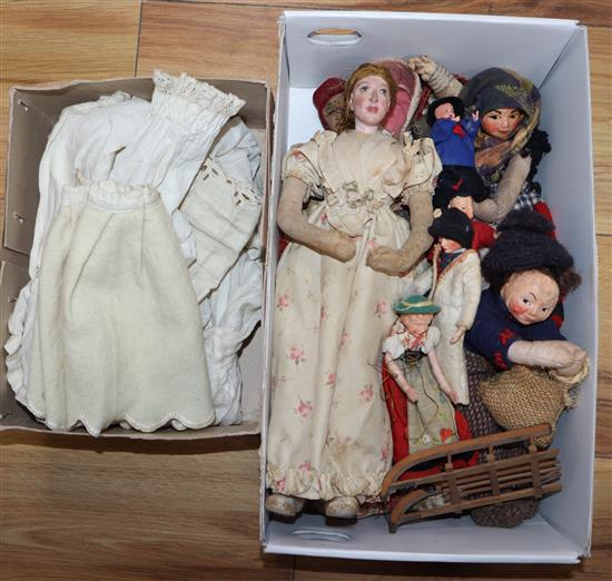 Late 19th / early 20th century European fabric dolls in costume and a collection of other dolls costume clothes